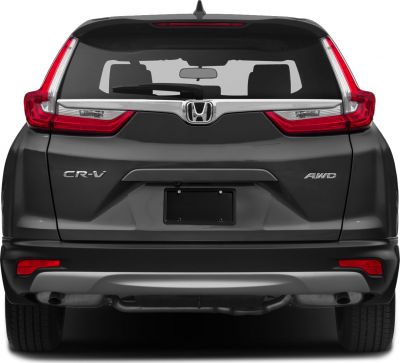 Rear view showcasing distinctive tail lights and chrome trim with AWD badge