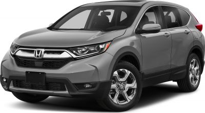Front right-angle view showing grill, headlights, and alloy wheels.