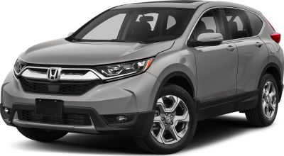 Front side view of compact SUV with sleek headlights and alloy wheels