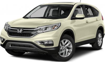 Front side view of SUV with chrome grille and alloy wheels