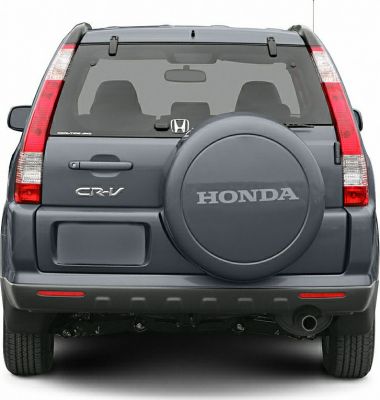 Rear view with spare tire cover and vertical tail lights.