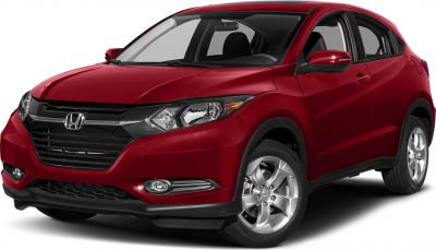 Front angled view with LED headlights and alloy wheels