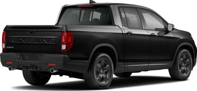 Black modern pickup with embossed tailgate and dual exhaust pipes