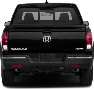 Pickup tailgate with AWD badge and rear taillights