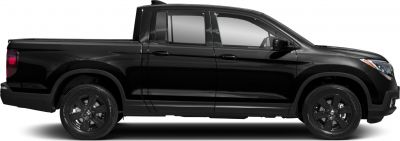 Side profile of mid-size pickup with black wheels and extended cab