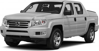 Pickup truck front and side view with distinctive grille and four doors