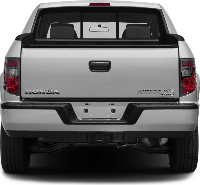 Rear tailgate and taillights with 4WD badge of a pickup truck
