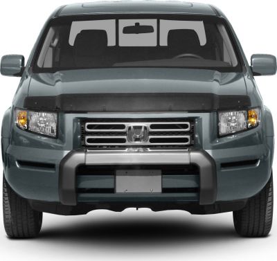 Pickup truck front with grille, bull bar, and headlights
