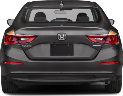 Rear view of a hybrid sedan with taillights and license plate area