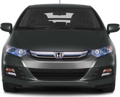 Front view showing headlights, grille, and bumper design