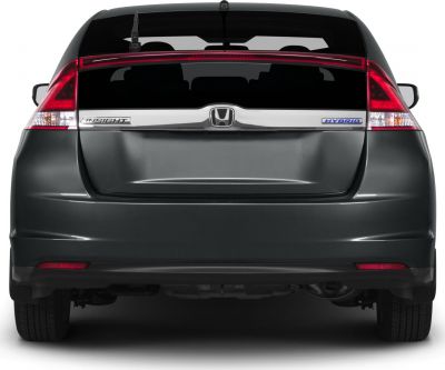 Rear view of hybrid hatchback with taillights and badges