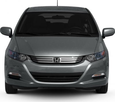 Front view emphasizing grille and headlights