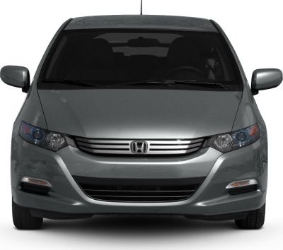 Sleek headlights, bold grille, aerodynamic front design