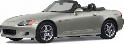 Front side view of a convertible roadster with alloy wheels