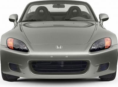 Close-up front view showing headlights, hood, and windshield.