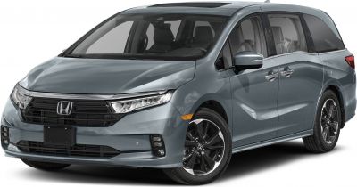Front view of modern minivan with sleek headlights and alloy wheels