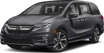 Front-side view of minivan with LED headlights and alloy wheels