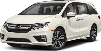 Front-side view of a white minivan with LED headlights and alloy wheels