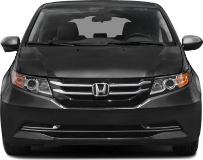 Front view with chrome grille and headlights