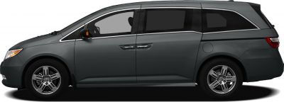 Side view showing sliding doors and alloy wheels of a minivan.