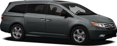Side view of minivan with sliding door and alloy wheels