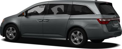 Side profile of a minivan with sliding door and alloy wheels