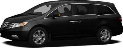 Side profile of a black minivan with sliding doors and alloy wheels