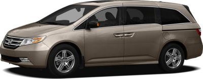 Side profile of minivan with sliding door and alloy wheels