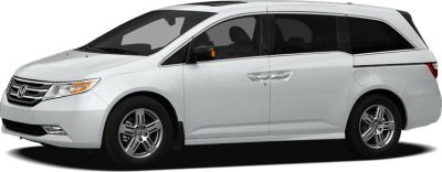 Silver minivan side profile with sliding door and alloy wheels