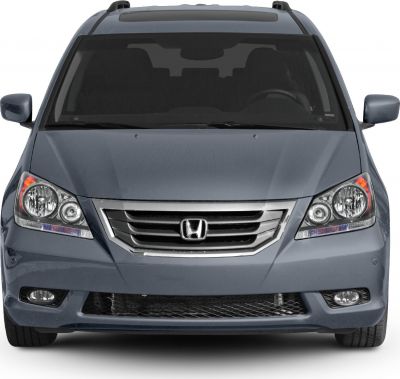 Front view with chrome grille and dual headlights