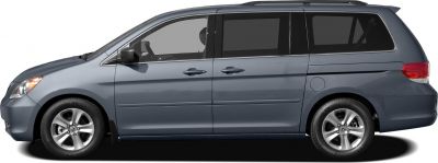 Side view of minivan with tinted windows and alloy wheels