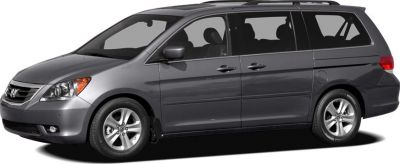 Side profile of 2005 Honda Odyssey III minivan with sliding doors and alloy wheels