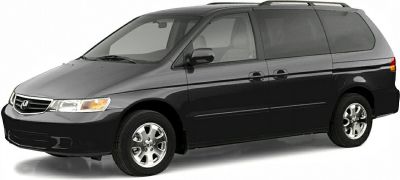 Side profile of a black minivan with sliding doors and alloy wheels