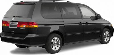 Black minivan with sliding rear doors and roof rails