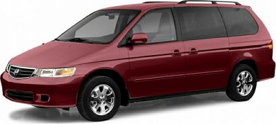 Red minivan with side sliding doors and alloy wheels