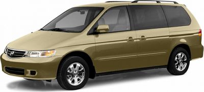 Front and side profile of minivan with sliding doors and roof rails