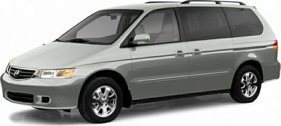 Side view of 1999 Odyssey II minivan with roof rails and sliding doors
