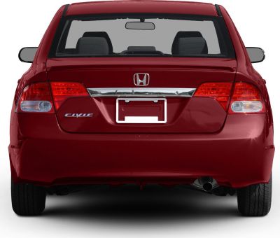 Rear view of sporty hatchback with taillights and single exhaust