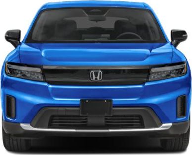 Front view of blue vehicle with LED headlights and modern grill