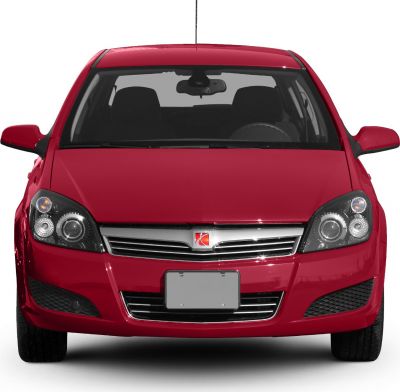 Front view showing dual round headlights and chrome-accented grille