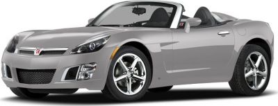 Sleek gray convertible roadster with sharp headlights and chrome alloy wheels.