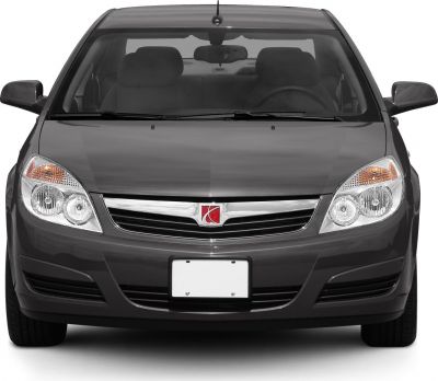 Front view with prominent grille and dual headlights