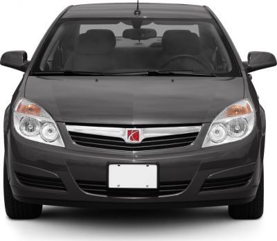 Front view with detailed headlights and chrome grille.