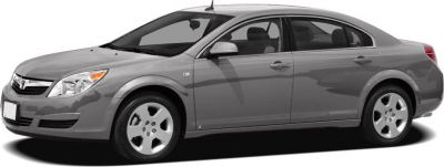 Front side view of a gray mid-size four-door sedan with alloy wheels