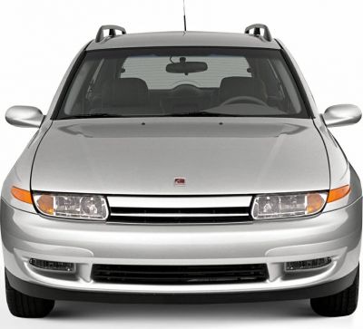 Front view with distinctive headlights and grille