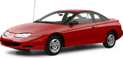 Red coupe front view with aerodynamic body and compact design