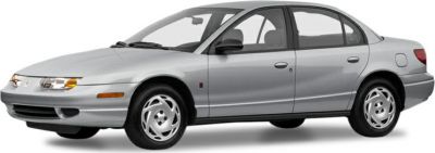 Side profile of a silver compact four-door sedan with classic wheel design