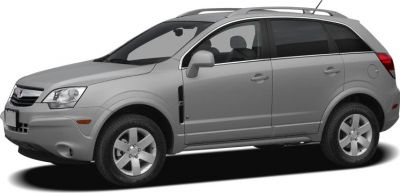 Side profile of a compact SUV with alloy wheels and roof rails.