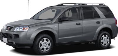Front-side view of a gray SUV with alloy wheels and roof rack.