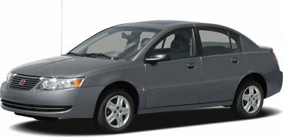 Four-door sedan with front grille and alloy wheels